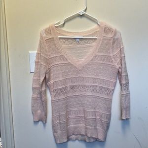 Light pink sweater.
